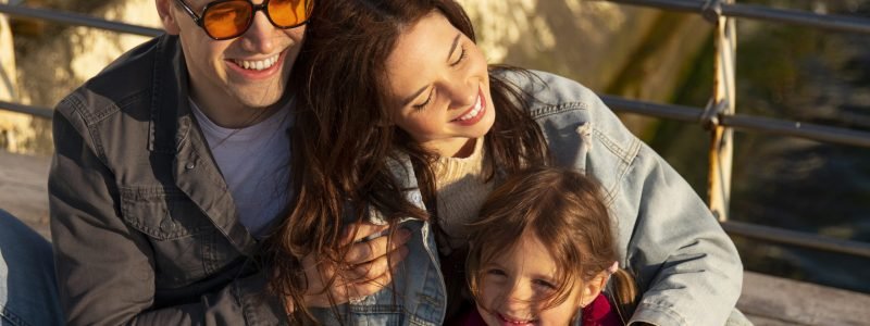 high-angle-family-hanging-out-jetty 1